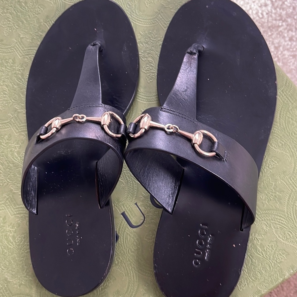 Black Gucci thong sandals